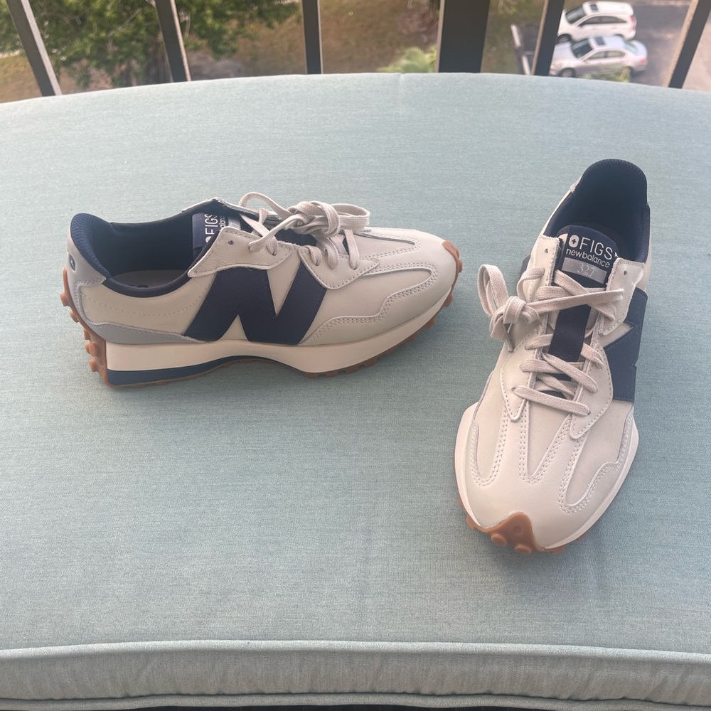 New Balance White and Navy Sneakers